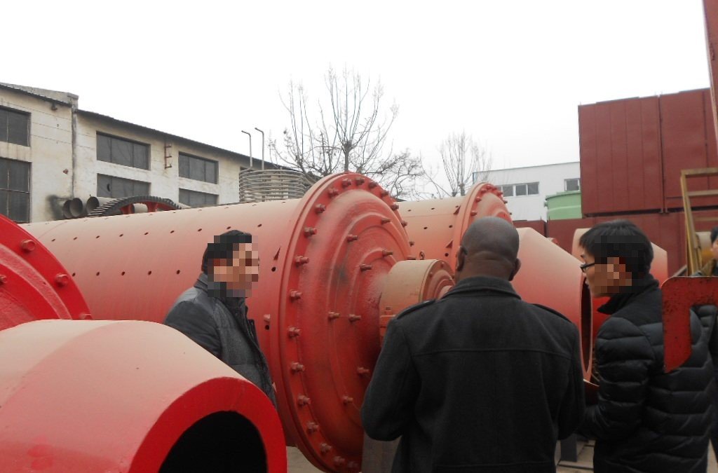Customer inspecting ball mills at our workshop
